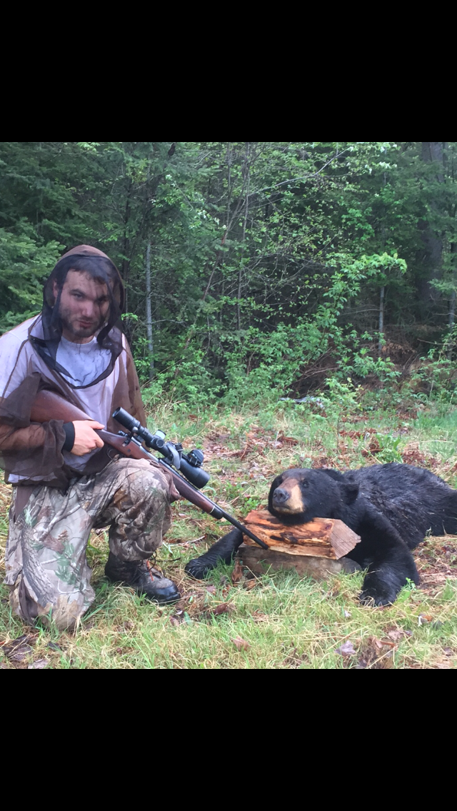 Norway hunter and his spring bear